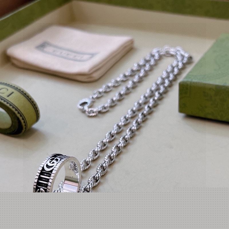 G*u*i necklaces
